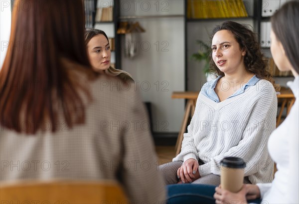 Close up women indoors therapy