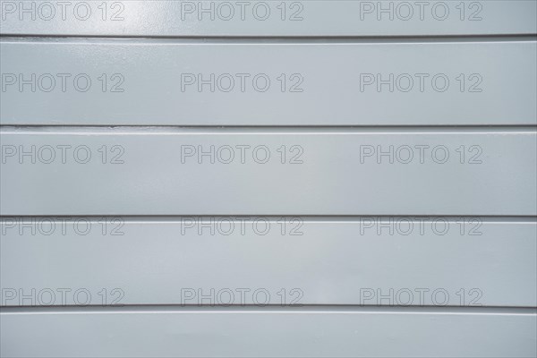 Texture light grey plastic panel wall