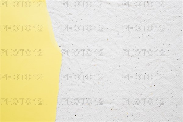 Yellow paper white old textured background