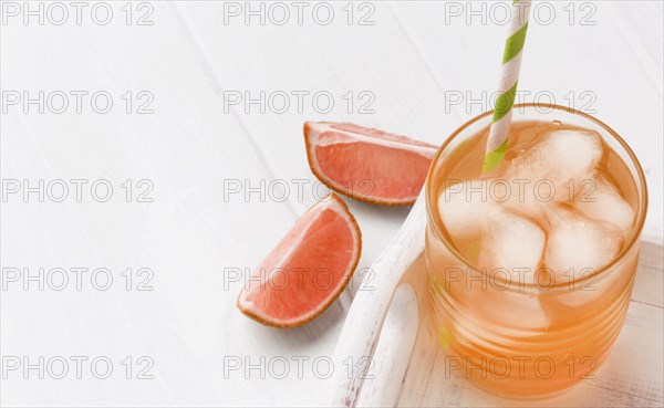 Glass with soft drink grapefruit