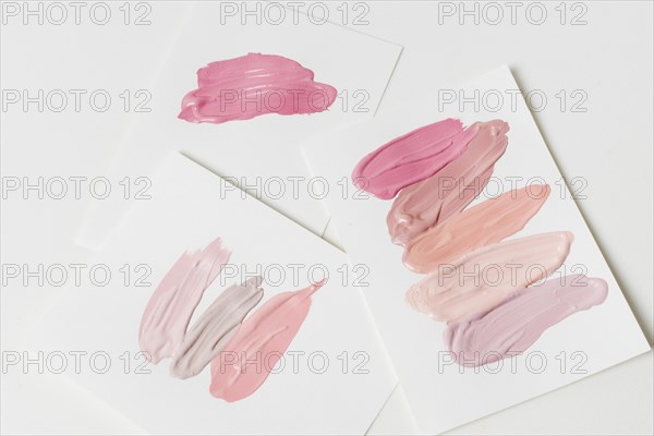 Cosmetic product strokes paper