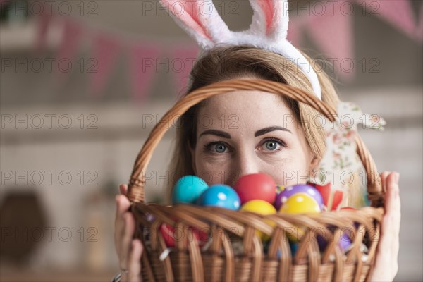 Portrait cute woman with bunny ears