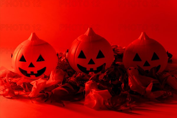 Halloween pumpkins on a red background