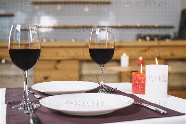 Romantic dinner table with wine glasses