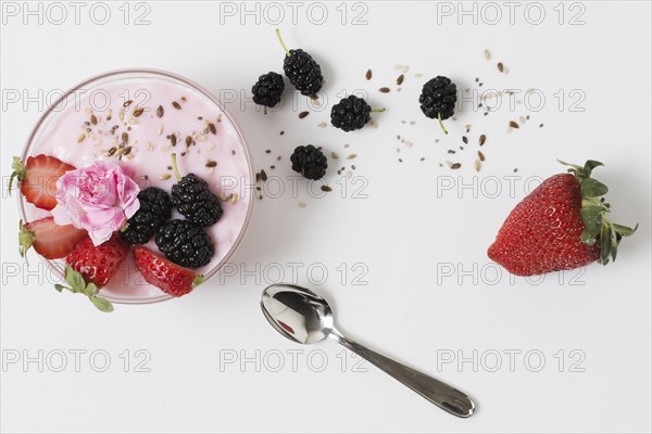 Top view fruit yoghurt with rose