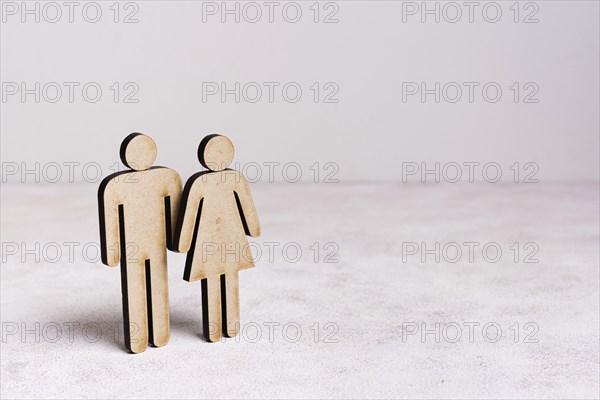 Cardboard man woman equality concept with copy space