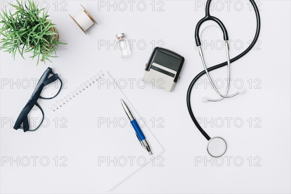 Glasses notebook near medical supplies