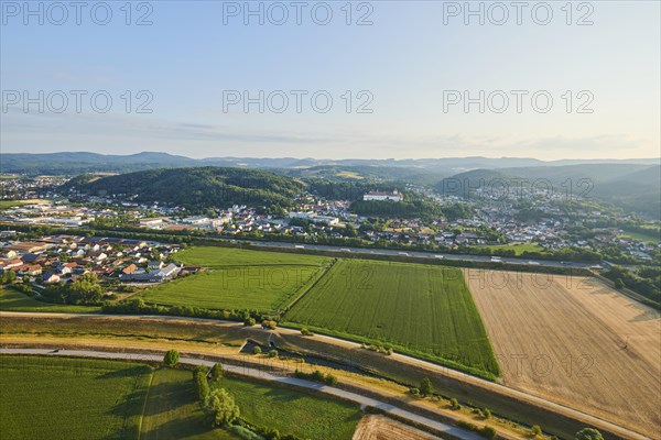 Aerial view over the fields and forests to the castle in Woerth an der Donau