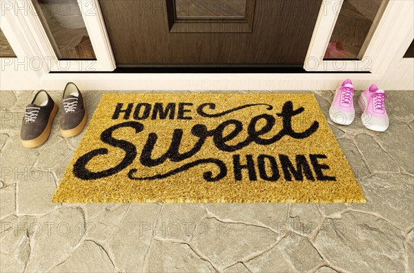 Home sweet home doormat with man and woman shoes on the porch at the front door