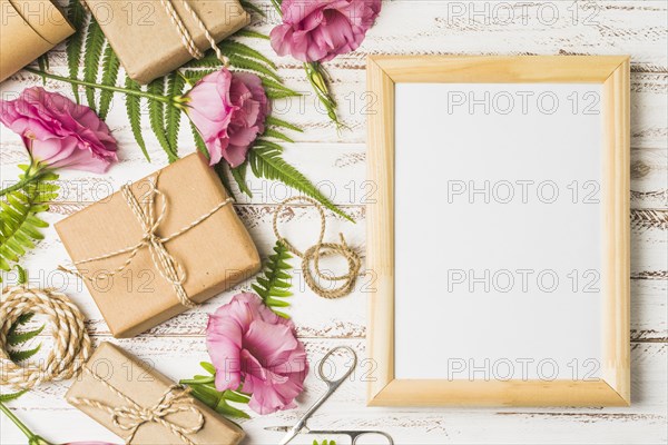 Eustoma flower packed gifts with empty frame table