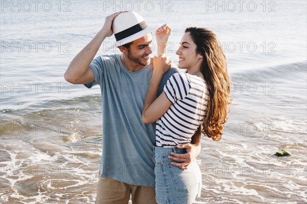 Young couple love beach