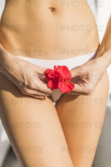 Girl holding flower