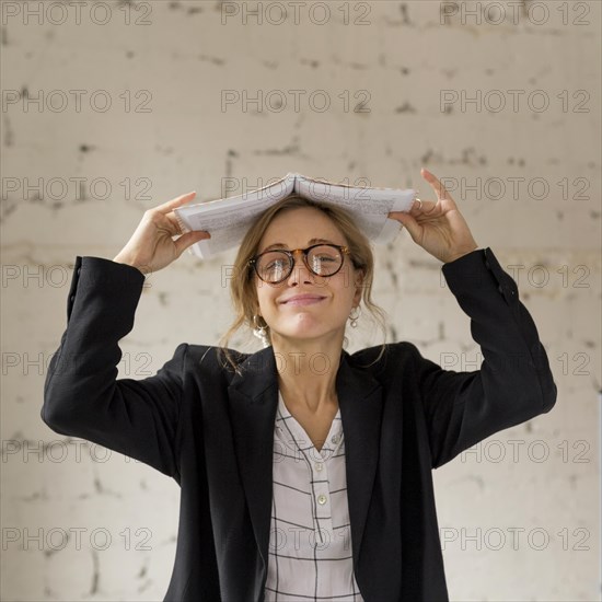 Tired teacher with book head