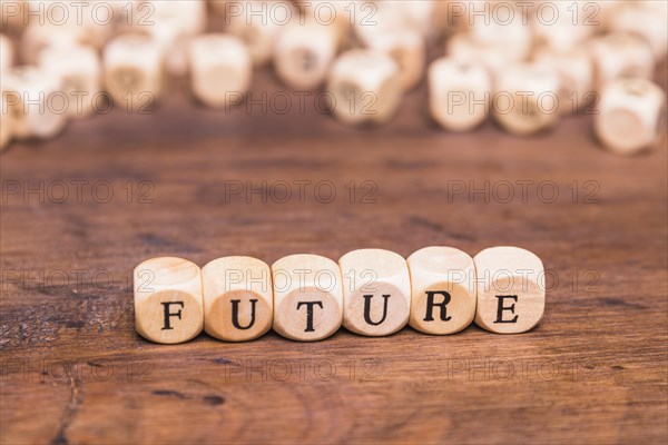 Future text with wooden dices desk