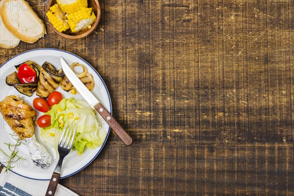 Plate with bbq raw vegetables bread