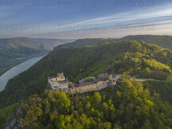 Drone shot of Aggstein Ruin at sunrise with Danube