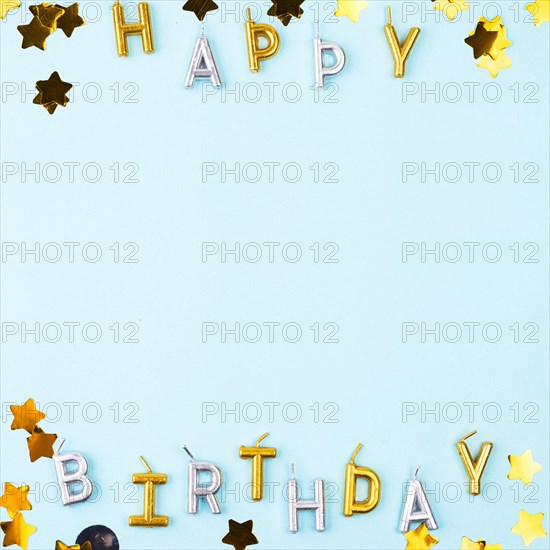 Flat lay happy birthday candles frame