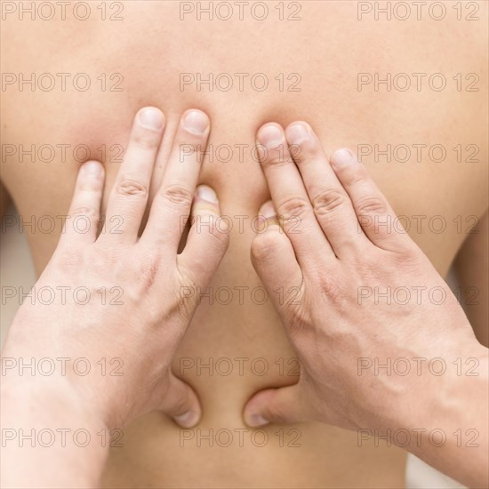 Close up hands massaging client