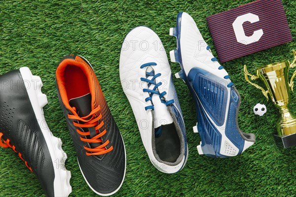 Football background grass with shoes