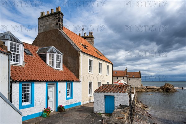 Traditional old dwellings lined up along the Fife Coastal Path in the fishing village of Pittenweem