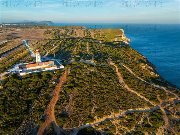 Aerial drone view of lighthouse on Cabo Espichel cape Espichel on Atlantic ocean