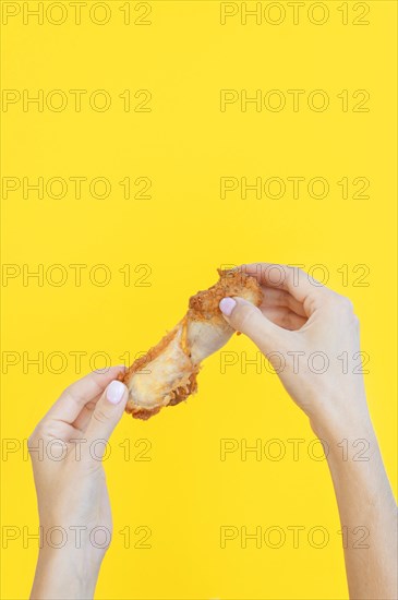 Front view hand holding food leftovers