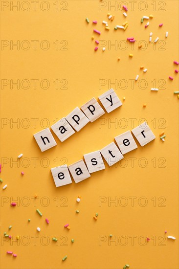 Top view happy easter greeting made out scrabble