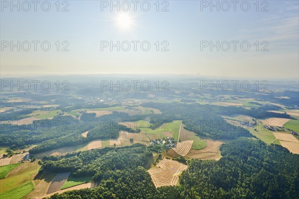Aerial view over the fields and forests near Woerth an der Donau