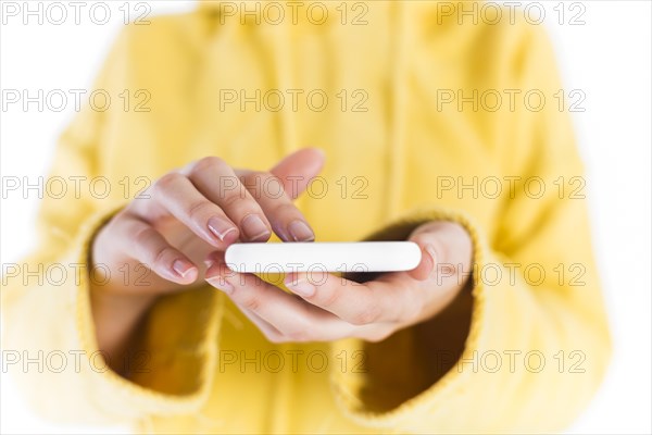 Close up female s hand using smartphone