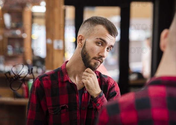 Portrait handsome man after haircut