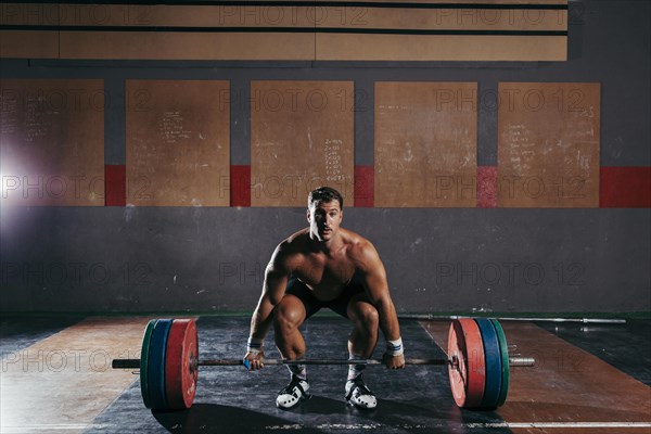 Strong man doing bodybuilding