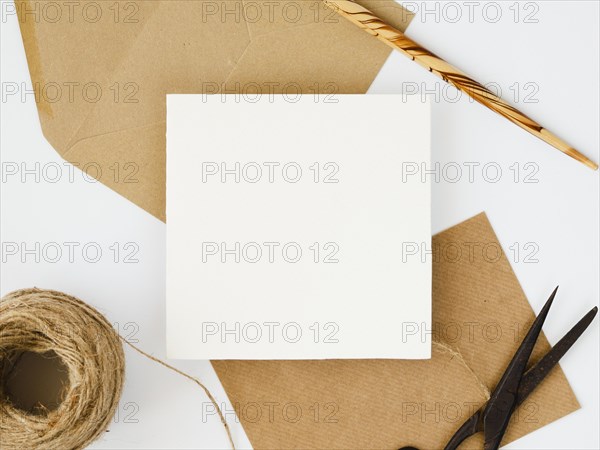 Top view arrangement white brown envelopes