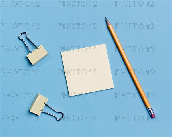 Top view paper clips pencil desk