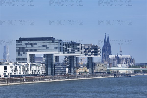 City view of the Rheinauhafen in Cologne with the 3 crane houses