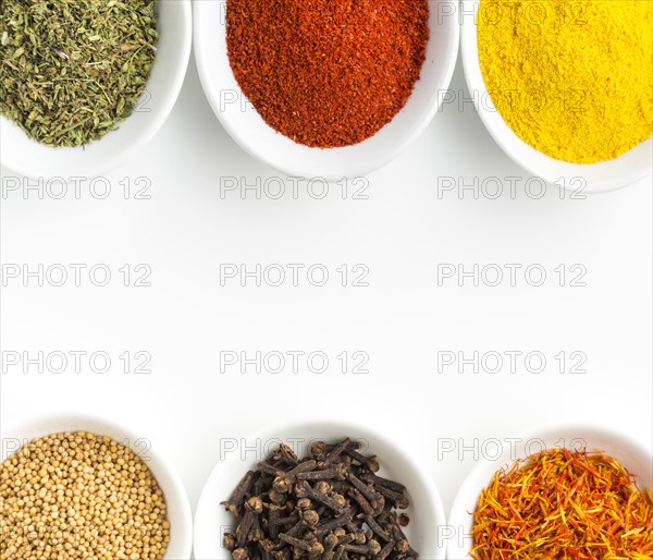 Top view spoons with spices powder