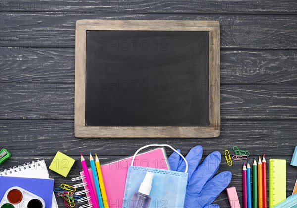 Top view back school stationery with multicolored pencils