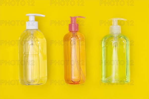 Top view plastic bottles with hand sanitizer liquid soap