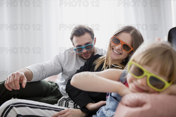 Family 3d glasses looking camera