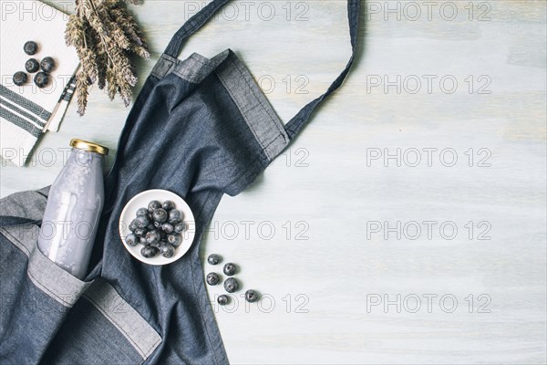 Flat lay blue smoothie apron with copy space