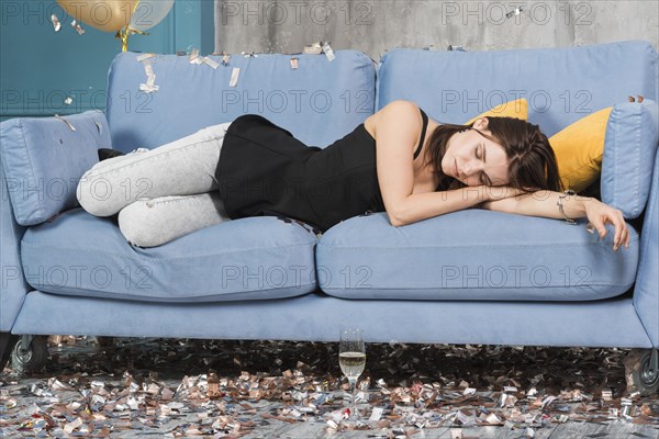 Woman sleeping after party