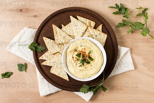 Top view nacho chips with hummus