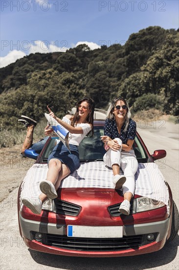 Enjoyable friends making fun vacation trip
