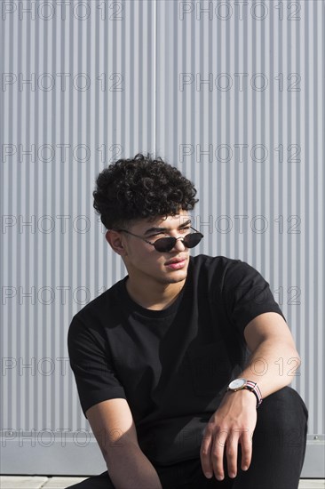 Cool black guy with curly hair sunglasses
