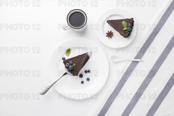 Top view chocolate cake slices plates