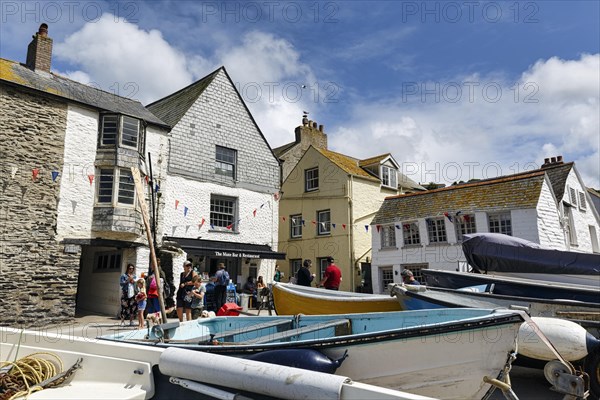 Pedestrians and boats in the harbour