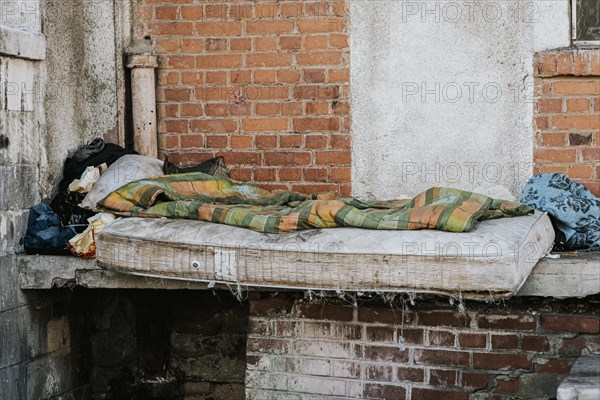 Front view mattress blanket homeless people