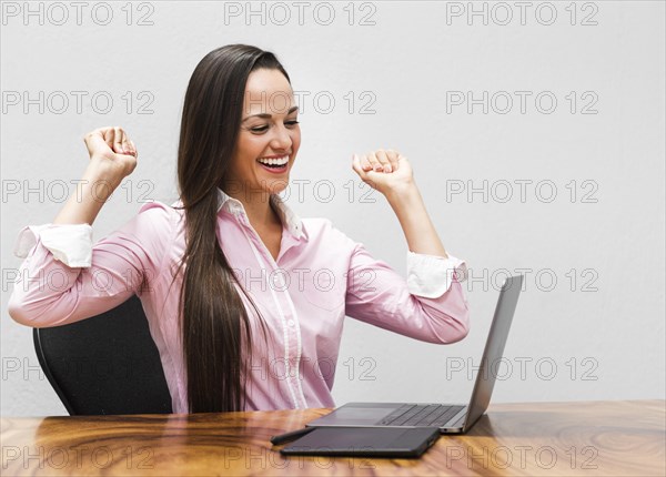 Business woman being happy about project