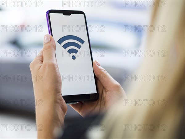 Woman holding phone