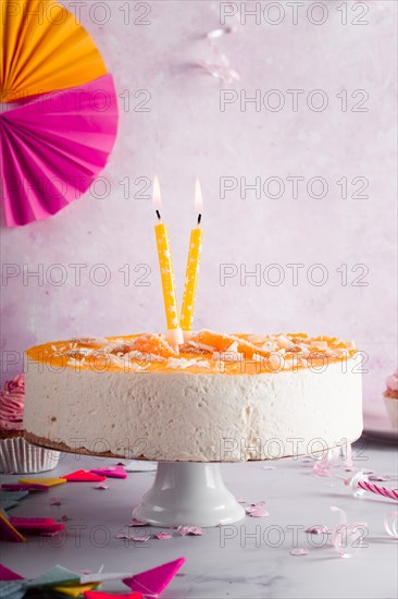 Birthday cake with lit candles
