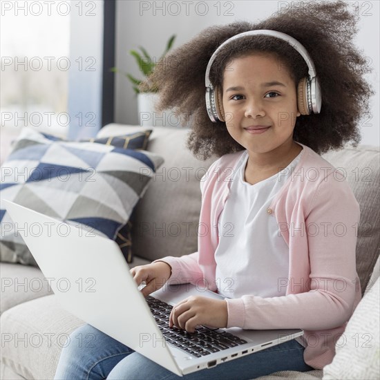 Portrait cute young girl with curly hair